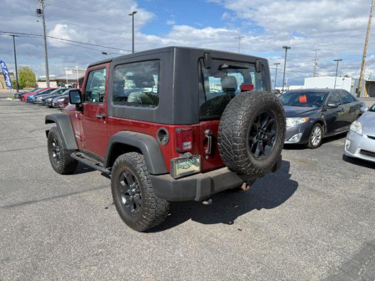 2010 MAROON /Dark Slate Gray/Med Slate Gray Jeep Wrangler Sport (1J4AA2D12AL) with an 3.8L V-6 regular unleaded engine, AUTOMATIC transmission, located at 1235 N Woodruff Ave., Idaho Falls, 83401, (208) 523-1053, 43.507172, -112.000488 - At Timberline Auto, finding a great deal on your next vehicle is always easy! Our experienced sales staff's goal is to help find you the right vehicle at the right price! Our knowledgeable finance department has options for almost any credit score. We offer extended service contract options to prote - Photo#2