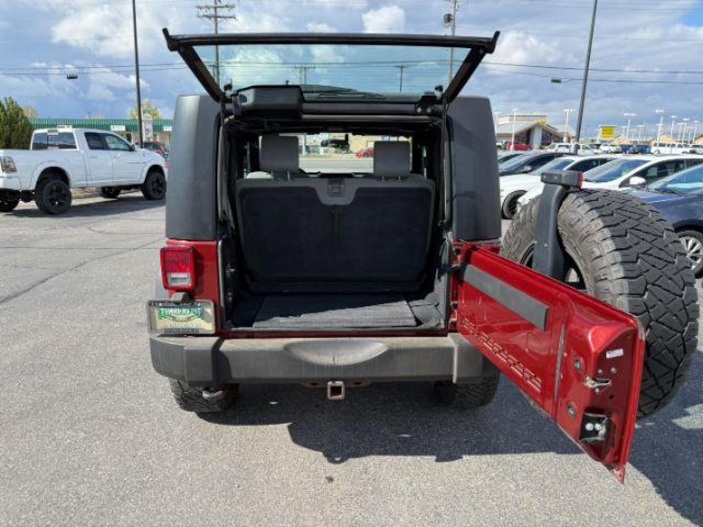 2010 MAROON /Dark Slate Gray/Med Slate Gray Jeep Wrangler Sport (1J4AA2D12AL) with an 3.8L V-6 regular unleaded engine, AUTOMATIC transmission, located at 1235 N Woodruff Ave., Idaho Falls, 83401, (208) 523-1053, 43.507172, -112.000488 - At Timberline Auto, finding a great deal on your next vehicle is always easy! Our experienced sales staff's goal is to help find you the right vehicle at the right price! Our knowledgeable finance department has options for almost any credit score. We offer extended service contract options to prote - Photo#4