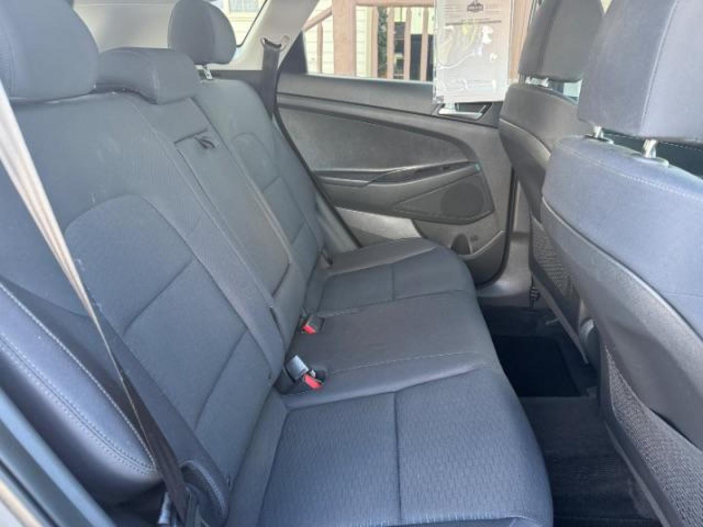 2019 GRAY /Black Hyundai Tucson SE (KM8J2CA43KU) with an Nu 2L I-4 gasoline direct injection engine, AUTOMATIC transmission, located at 1235 N Woodruff Ave., Idaho Falls, 83401, (208) 523-1053, 43.507172, -112.000488 - At Timberline Auto, finding a great deal on your next vehicle is always easy! Our experienced sales staff's goal is to help find you the right vehicle at the right price! Our knowledgeable finance department has options for almost any credit score. We offer extended service contract options to prote - Photo#12