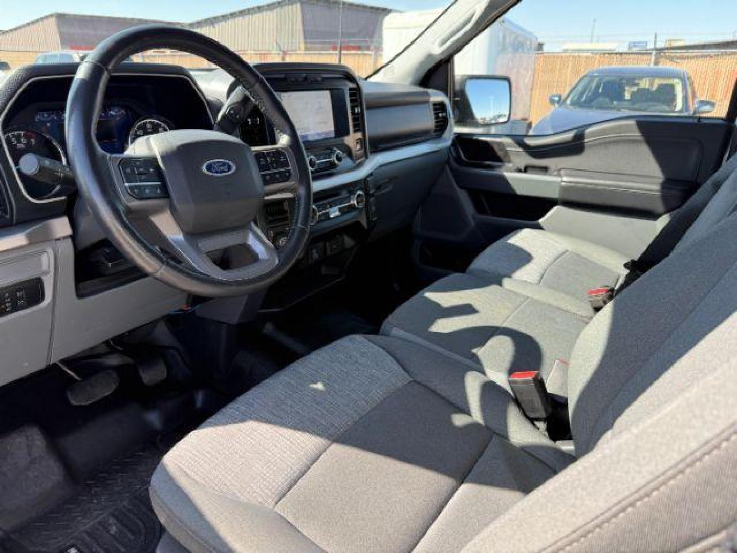 2021 Oxford White /Black/Medium Dark Slate Ford F-150 XLT (1FTFW1E87MK) with an 3.5L V-6 port/direct injection engine, AUTOMATIC transmission, located at 1235 N Woodruff Ave., Idaho Falls, 83401, (208) 523-1053, 43.507172, -112.000488 - At Timberline Auto, finding a great deal on your next vehicle is always easy! Our experienced sales staff's goal is to help find you the right vehicle at the right price! Our knowledgeable finance department has options for almost any credit score. We offer extended service contract options to prote - Photo#12
