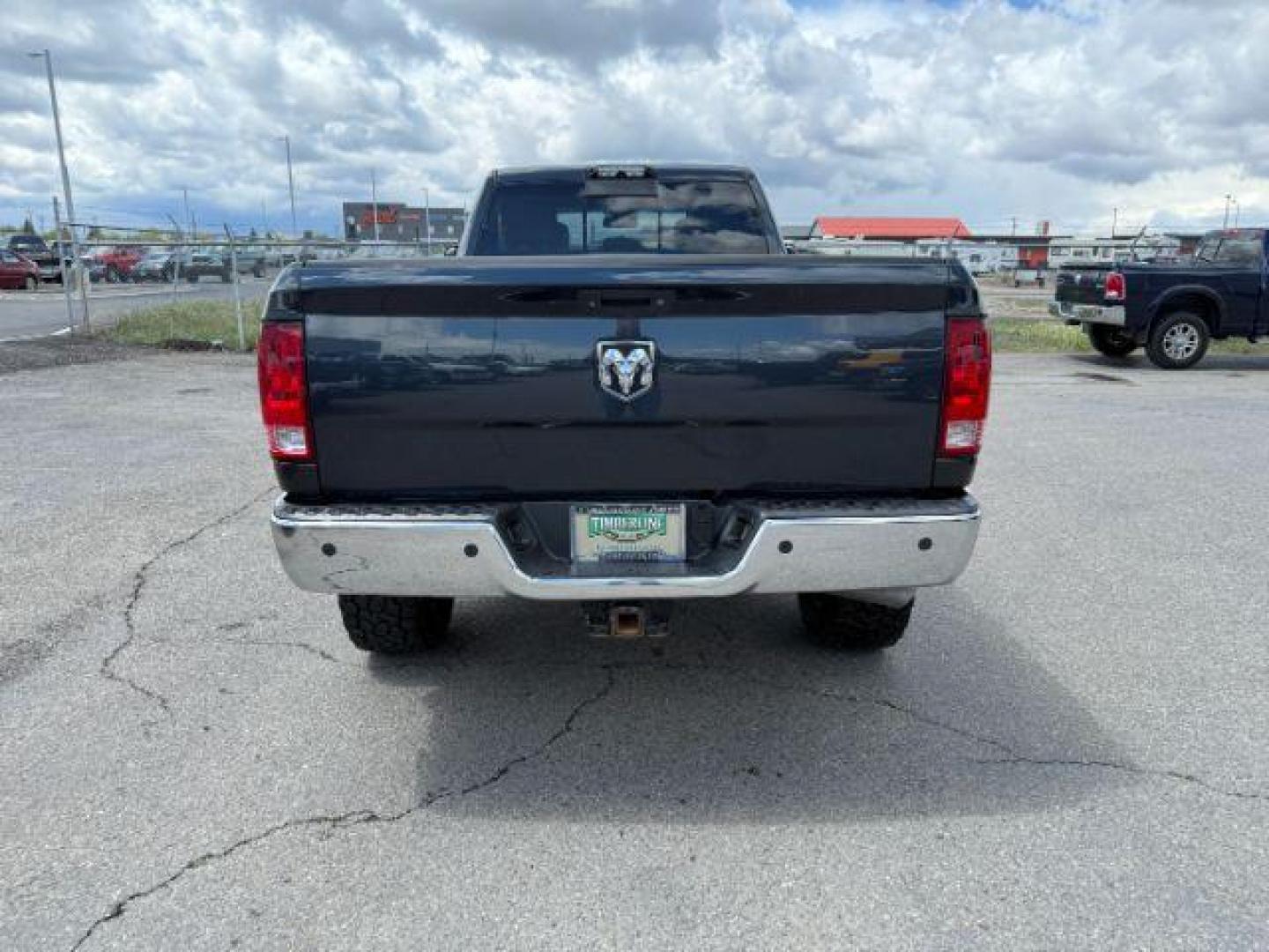 2014 Black Clearcoat /Diesel Gray/Black Ram 3500 SLT (3C63R3HL7EG) with an Cummins 6.7L I-6 diesel direct injection engine, AUTOMATIC transmission, located at 1235 N Woodruff Ave., Idaho Falls, 83401, (208) 523-1053, 43.507172, -112.000488 - At Timberline Auto, finding a great deal on your next vehicle is always easy! Our experienced sales staff's goal is to help find you the right vehicle at the right price! Our knowledgeable finance department has options for almost any credit score. We offer extended service contract options to prote - Photo#3