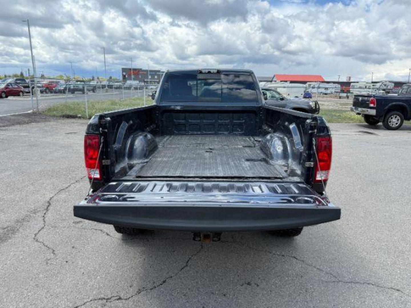 2014 Black Clearcoat /Diesel Gray/Black Ram 3500 SLT (3C63R3HL7EG) with an Cummins 6.7L I-6 diesel direct injection engine, AUTOMATIC transmission, located at 1235 N Woodruff Ave., Idaho Falls, 83401, (208) 523-1053, 43.507172, -112.000488 - At Timberline Auto, finding a great deal on your next vehicle is always easy! Our experienced sales staff's goal is to help find you the right vehicle at the right price! Our knowledgeable finance department has options for almost any credit score. We offer extended service contract options to prote - Photo#5