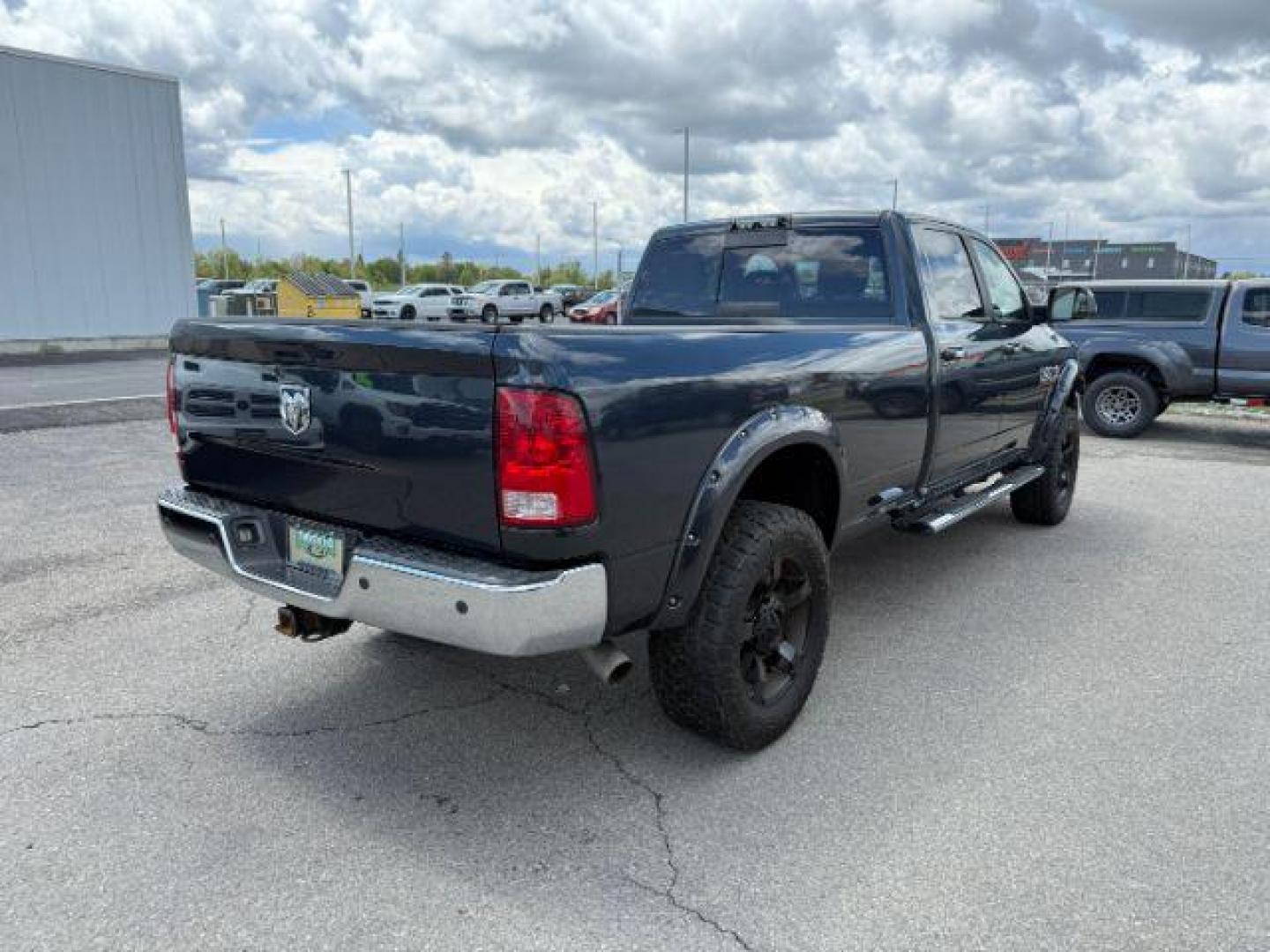2014 Black Clearcoat /Diesel Gray/Black Ram 3500 SLT (3C63R3HL7EG) with an Cummins 6.7L I-6 diesel direct injection engine, AUTOMATIC transmission, located at 1235 N Woodruff Ave., Idaho Falls, 83401, (208) 523-1053, 43.507172, -112.000488 - At Timberline Auto, finding a great deal on your next vehicle is always easy! Our experienced sales staff's goal is to help find you the right vehicle at the right price! Our knowledgeable finance department has options for almost any credit score. We offer extended service contract options to prote - Photo#6