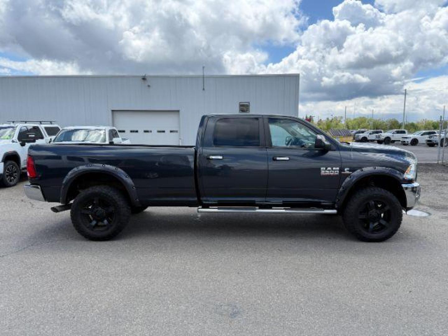 2014 Black Clearcoat /Diesel Gray/Black Ram 3500 SLT (3C63R3HL7EG) with an Cummins 6.7L I-6 diesel direct injection engine, AUTOMATIC transmission, located at 1235 N Woodruff Ave., Idaho Falls, 83401, (208) 523-1053, 43.507172, -112.000488 - At Timberline Auto, finding a great deal on your next vehicle is always easy! Our experienced sales staff's goal is to help find you the right vehicle at the right price! Our knowledgeable finance department has options for almost any credit score. We offer extended service contract options to prote - Photo#7