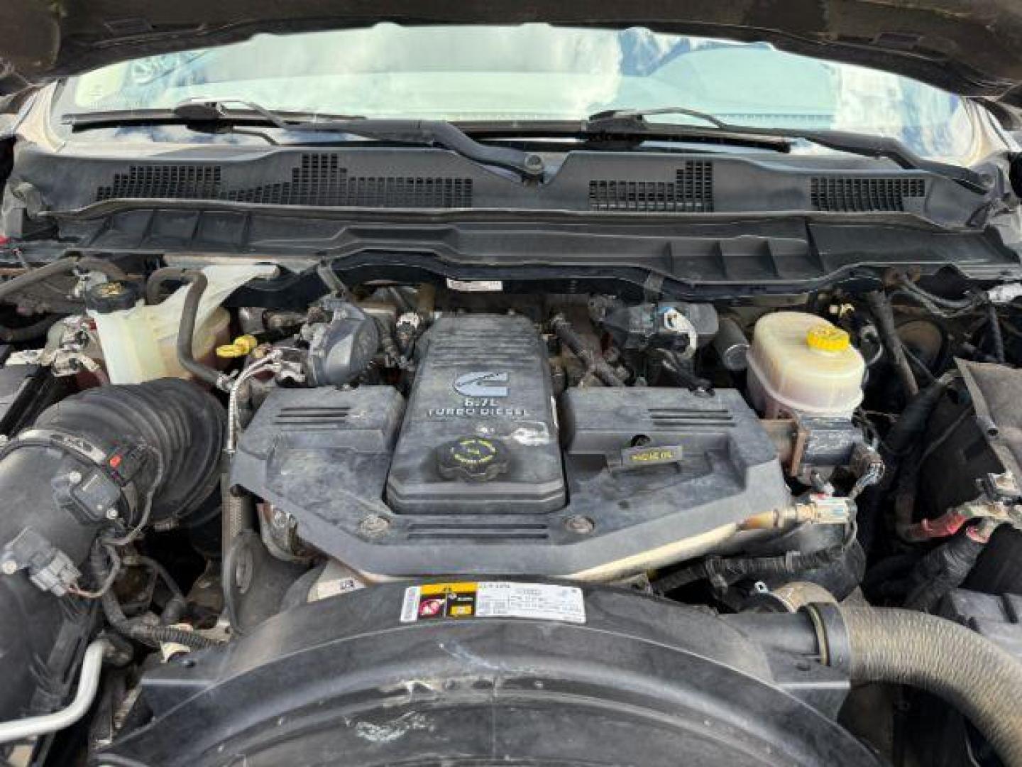 2014 Black Clearcoat /Diesel Gray/Black Ram 3500 SLT (3C63R3HL7EG) with an Cummins 6.7L I-6 diesel direct injection engine, AUTOMATIC transmission, located at 1235 N Woodruff Ave., Idaho Falls, 83401, (208) 523-1053, 43.507172, -112.000488 - At Timberline Auto, finding a great deal on your next vehicle is always easy! Our experienced sales staff's goal is to help find you the right vehicle at the right price! Our knowledgeable finance department has options for almost any credit score. We offer extended service contract options to prote - Photo#21