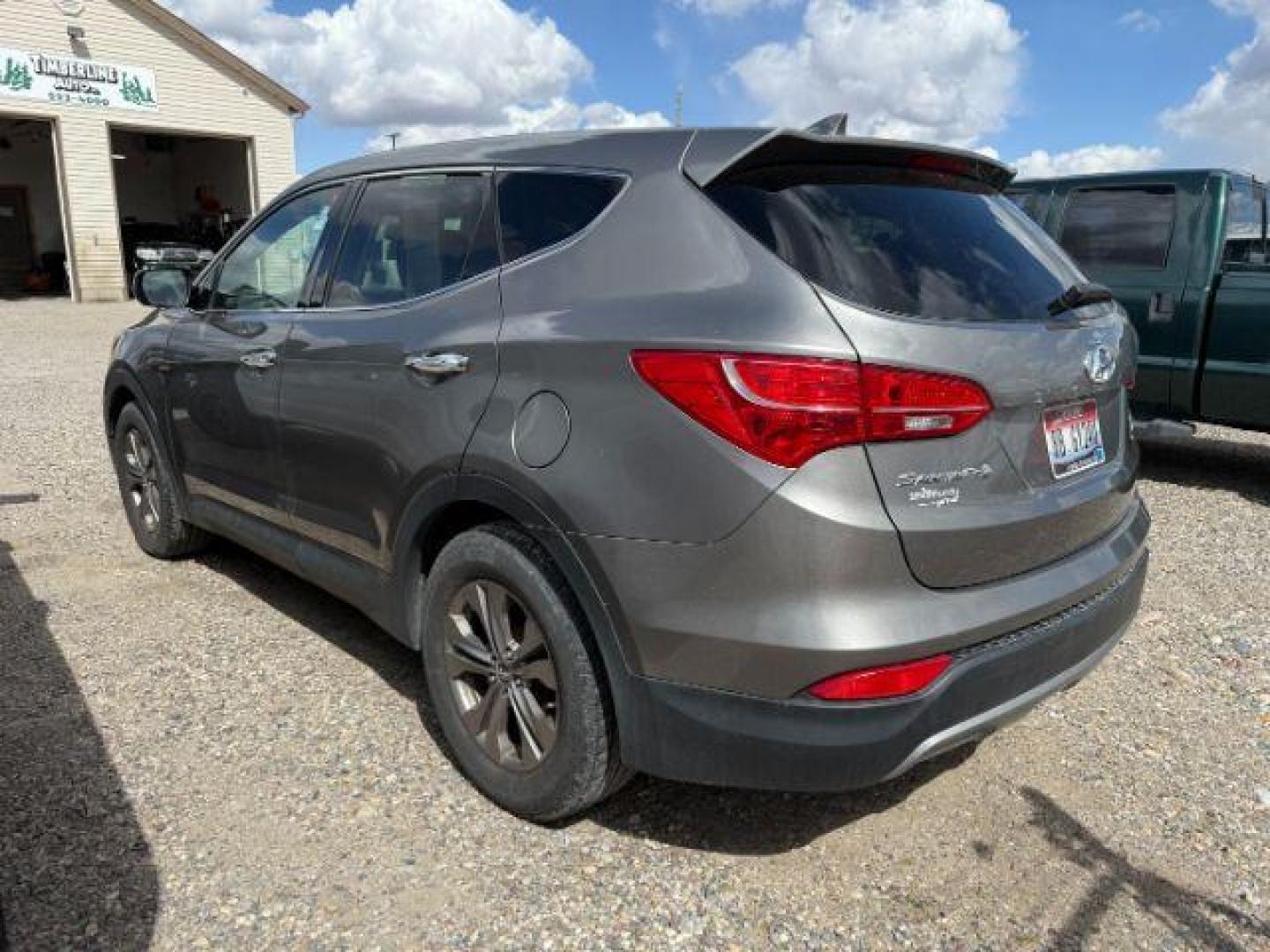 2013 Mineral Gray /Gray Hyundai Santa Fe Sport (5XYZTDLB3DG) with an Theta II 2.4L I-4 gasoline direct injection engine, AUTOMATIC transmission, located at 1235 N Woodruff Ave., Idaho Falls, 83401, (208) 523-1053, 43.507172, -112.000488 - At Timberline Auto, finding a great deal on your next vehicle is always easy! Our experienced sales staff's goal is to help find you the right vehicle at the right price! Our knowledgeable finance department has options for almost any credit score. We offer extended service contract options to prote - Photo#1