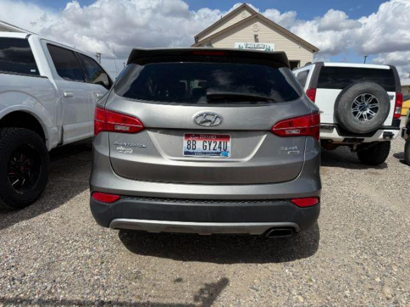 2013 Mineral Gray /Gray Hyundai Santa Fe Sport (5XYZTDLB3DG) with an Theta II 2.4L I-4 gasoline direct injection engine, AUTOMATIC transmission, located at 1235 N Woodruff Ave., Idaho Falls, 83401, (208) 523-1053, 43.507172, -112.000488 - At Timberline Auto, finding a great deal on your next vehicle is always easy! Our experienced sales staff's goal is to help find you the right vehicle at the right price! Our knowledgeable finance department has options for almost any credit score. We offer extended service contract options to prote - Photo#2