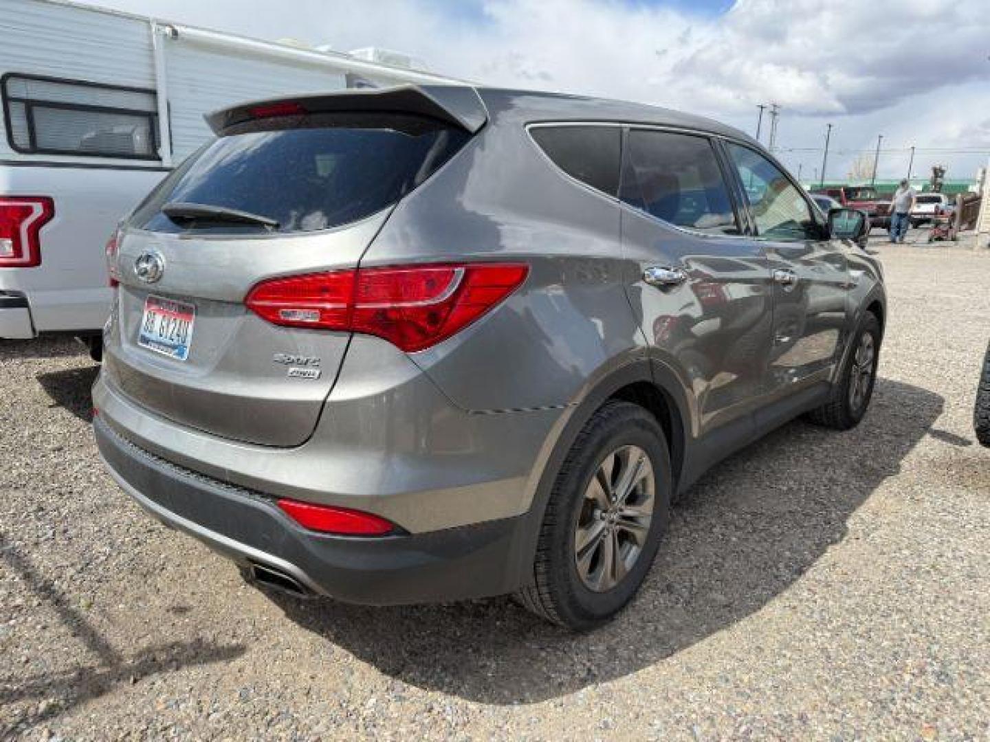 2013 Mineral Gray /Gray Hyundai Santa Fe Sport (5XYZTDLB3DG) with an Theta II 2.4L I-4 gasoline direct injection engine, AUTOMATIC transmission, located at 1235 N Woodruff Ave., Idaho Falls, 83401, (208) 523-1053, 43.507172, -112.000488 - At Timberline Auto, finding a great deal on your next vehicle is always easy! Our experienced sales staff's goal is to help find you the right vehicle at the right price! Our knowledgeable finance department has options for almost any credit score. We offer extended service contract options to prote - Photo#3