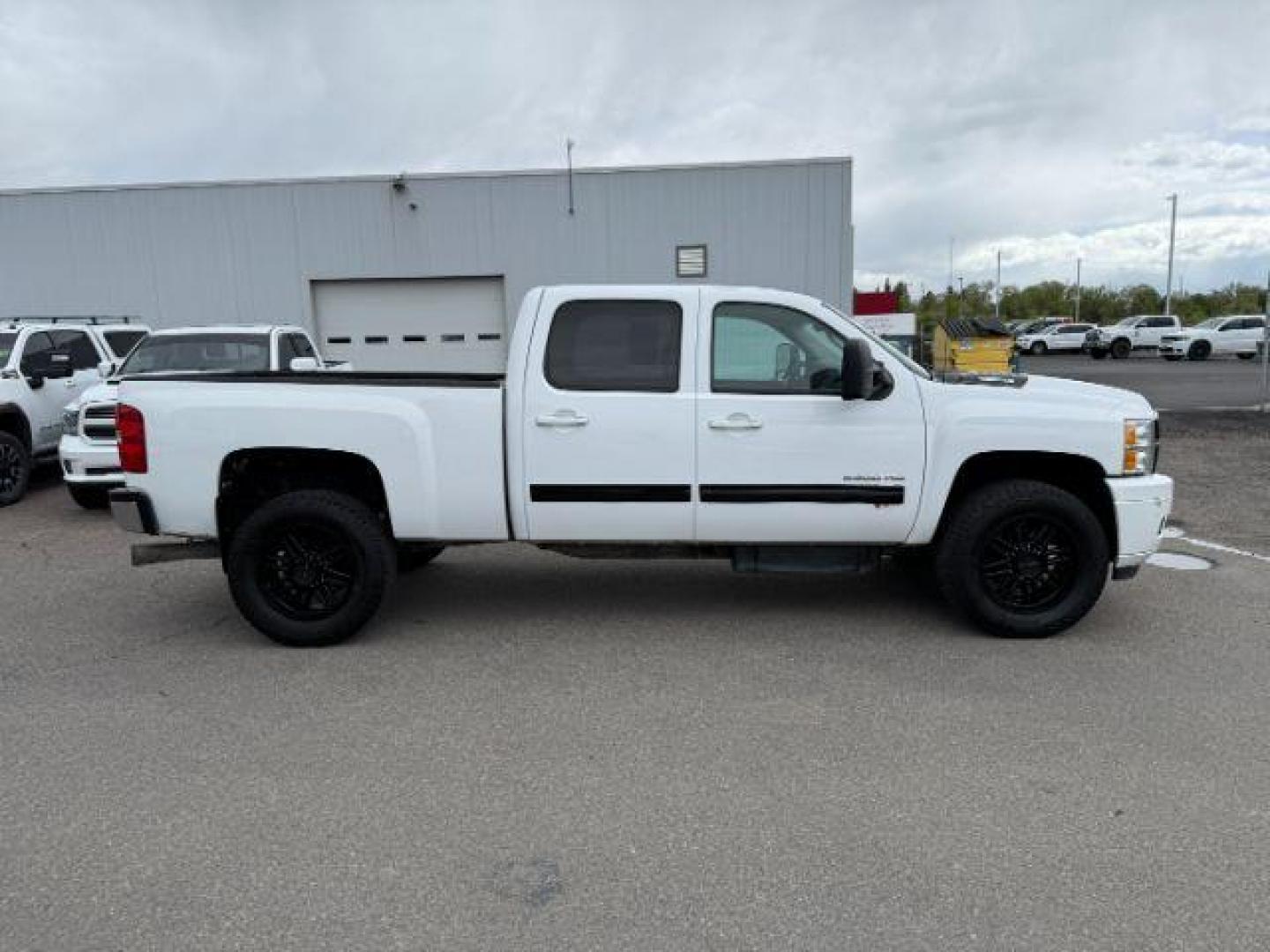 2014 Summit White /Ebony Chevrolet Silverado 2500HD LTZ (1GC1KYE8XEF) with an Duramax 6.6L V-8 diesel direct injection engine, AUTOMATIC transmission, located at 1235 N Woodruff Ave., Idaho Falls, 83401, (208) 523-1053, 43.507172, -112.000488 - At Timberline Auto, finding a great deal on your next vehicle is always easy! Our experienced sales staff's goal is to help find you the right vehicle at the right price! Our knowledgeable finance department has options for almost any credit score. We offer extended service contract options to prote - Photo#29