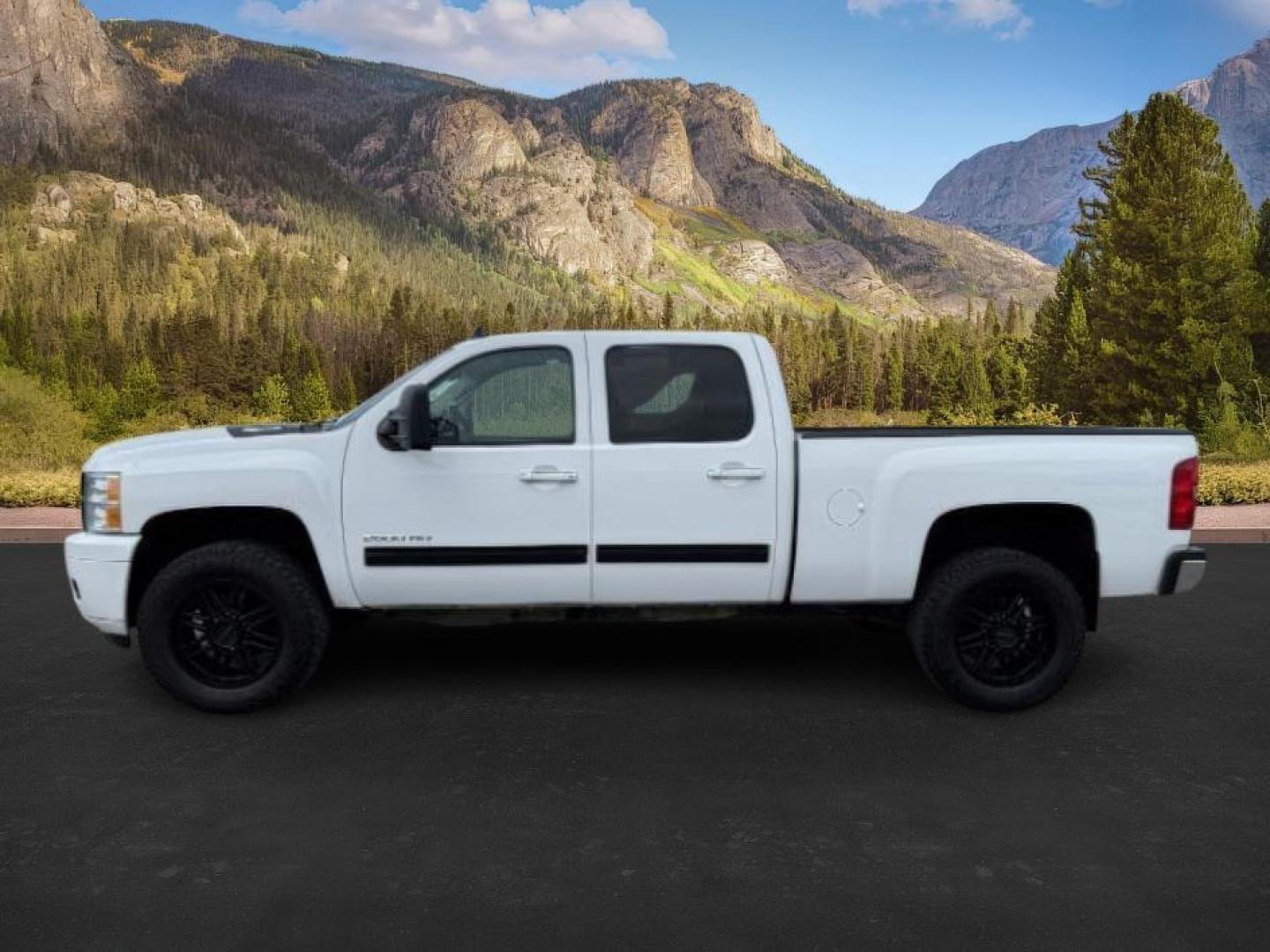2014 Summit White /Ebony Chevrolet Silverado 2500HD LTZ (1GC1KYE8XEF) with an Duramax 6.6L V-8 diesel direct injection engine, AUTOMATIC transmission, located at 1235 N Woodruff Ave., Idaho Falls, 83401, (208) 523-1053, 43.507172, -112.000488 - At Timberline Auto, finding a great deal on your next vehicle is always easy! Our experienced sales staff's goal is to help find you the right vehicle at the right price! Our knowledgeable finance department has options for almost any credit score. We offer extended service contract options to prote - Photo#1