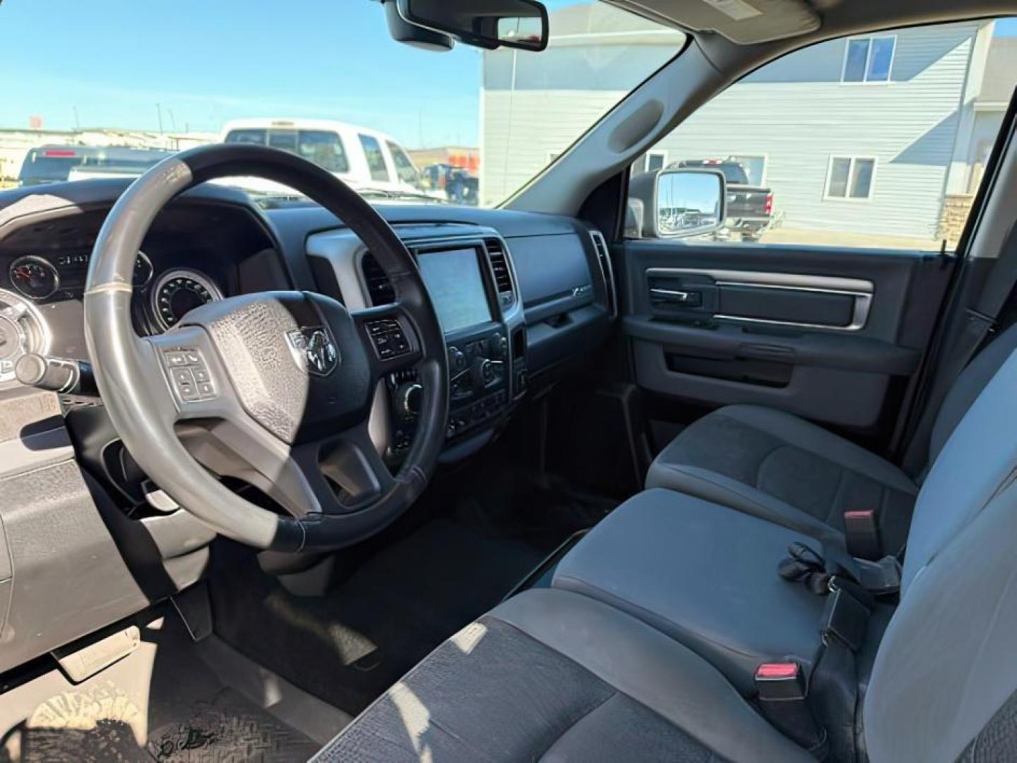 2017 GRAY /Diesel Gray/Black Ram 1500 Big Horn Crew Cab 4x4 5'7 Box (1C6RR7LM7HS) with an EcoDiesel 3L V-6 diesel direct injection engine, AUTOMATIC transmission, located at 1235 N Woodruff Ave., Idaho Falls, 83401, (208) 523-1053, 43.507172, -112.000488 - At Timberline Auto, finding a great deal on your next vehicle is always easy! Our experienced sales staff's goal is to help find you the right vehicle at the right price! Our knowledgeable finance department has options for almost any credit score. We offer extended service contract options to prote - Photo#11
