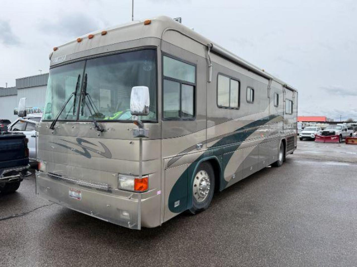 2002 GREY COUNTRY COACH INTRIGUE NA (4U7B6DY1521) , AUTOMATIC transmission, located at 1235 N Woodruff Ave., Idaho Falls, 83401, (208) 523-1053, 43.507172, -112.000488 - At Timberline Auto, finding a great deal on your next vehicle is always easy! Our experienced sales staff's goal is to help find you the right vehicle at the right price! Our knowledgeable finance department has options for almost any credit score. We offer extended service contract options to prote - Photo#0