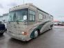 2002 GREY COUNTRY COACH INTRIGUE NA (4U7B6DY1521) , AUTOMATIC transmission, located at 1235 N Woodruff Ave., Idaho Falls, 83401, (208) 523-1053, 43.507172, -112.000488 - At Timberline Auto, finding a great deal on your next vehicle is always easy! Our experienced sales staff's goal is to help find you the right vehicle at the right price! Our knowledgeable finance department has options for almost any credit score. We offer extended service contract options to prote - Photo#0