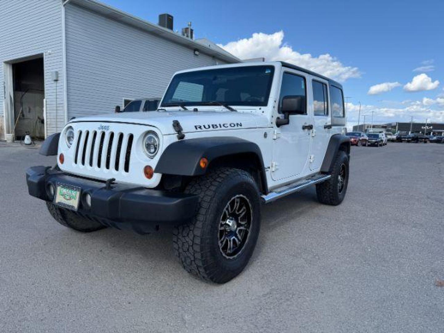 2012 Bright White Clearcoat /Black Jeep Wrangler Unlimited Rubicon (1C4BJWFG8CL) with an 3.6L V-6 DOHC engine, AUTOMATIC transmission, located at 1235 N Woodruff Ave., Idaho Falls, 83401, (208) 523-1053, 43.507172, -112.000488 - At Timberline Auto, finding a great deal on your next vehicle is always easy! Our experienced sales staff's goal is to help find you the right vehicle at the right price! Our knowledgeable finance department has options for almost any credit score. We offer extended service contract options to prote - Photo#0