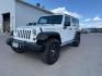 2012 Bright White Clearcoat /Black Jeep Wrangler Unlimited Rubicon (1C4BJWFG8CL) with an 3.6L V-6 DOHC engine, AUTOMATIC transmission, located at 1235 N Woodruff Ave., Idaho Falls, 83401, (208) 523-1053, 43.507172, -112.000488 - At Timberline Auto, finding a great deal on your next vehicle is always easy! Our experienced sales staff's goal is to help find you the right vehicle at the right price! Our knowledgeable finance department has options for almost any credit score. We offer extended service contract options to prote - Photo#0