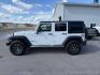 2012 Bright White Clearcoat /Black Jeep Wrangler Unlimited Rubicon (1C4BJWFG8CL) with an 3.6L V-6 DOHC engine, AUTOMATIC transmission, located at 1235 N Woodruff Ave., Idaho Falls, 83401, (208) 523-1053, 43.507172, -112.000488 - At Timberline Auto, finding a great deal on your next vehicle is always easy! Our experienced sales staff's goal is to help find you the right vehicle at the right price! Our knowledgeable finance department has options for almost any credit score. We offer extended service contract options to prote - Photo#1