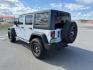 2012 Bright White Clearcoat /Black Jeep Wrangler Unlimited Rubicon (1C4BJWFG8CL) with an 3.6L V-6 DOHC engine, AUTOMATIC transmission, located at 1235 N Woodruff Ave., Idaho Falls, 83401, (208) 523-1053, 43.507172, -112.000488 - At Timberline Auto, finding a great deal on your next vehicle is always easy! Our experienced sales staff's goal is to help find you the right vehicle at the right price! Our knowledgeable finance department has options for almost any credit score. We offer extended service contract options to prote - Photo#2