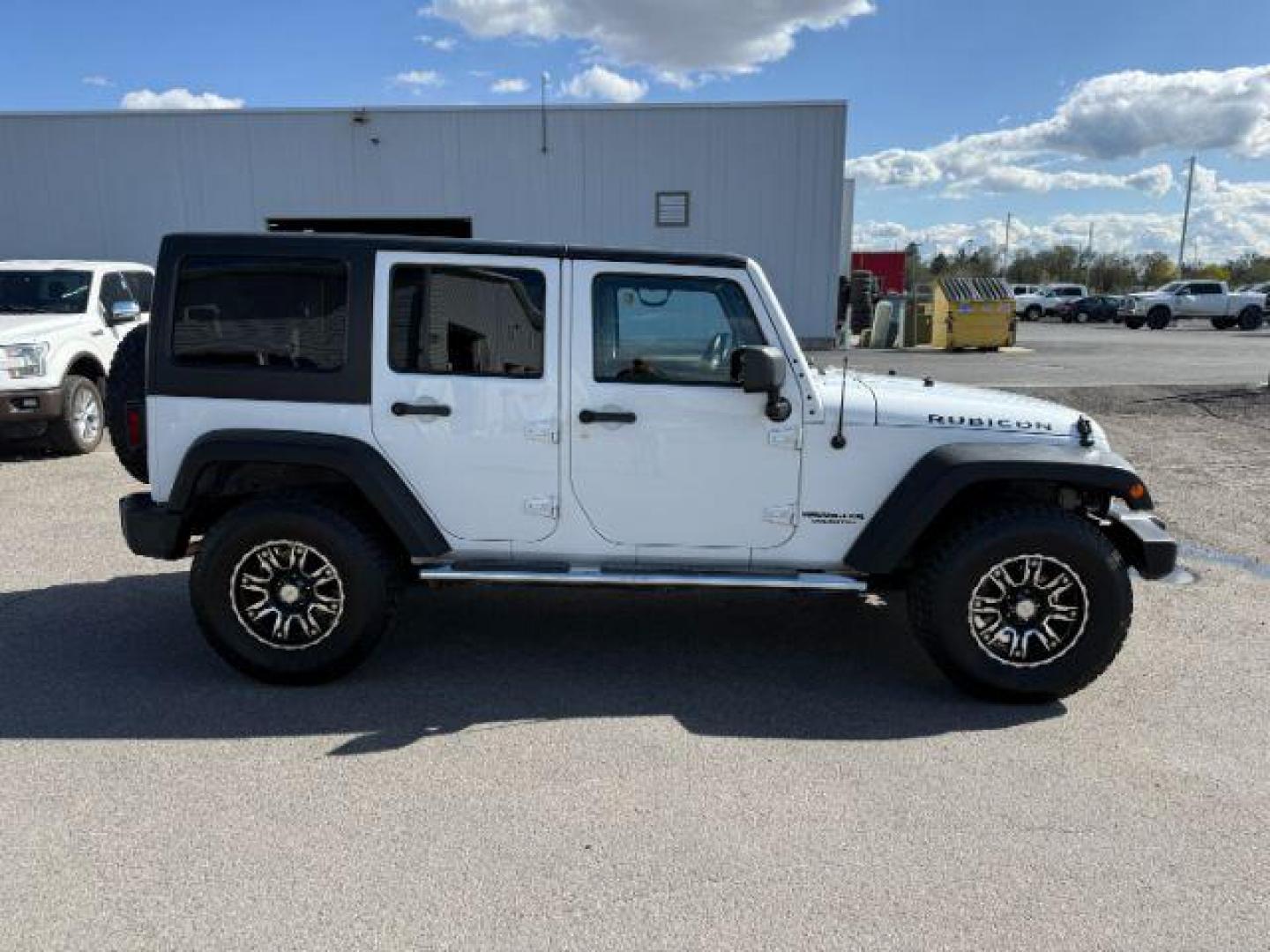 2012 Bright White Clearcoat /Black Jeep Wrangler Unlimited Rubicon (1C4BJWFG8CL) with an 3.6L V-6 DOHC engine, AUTOMATIC transmission, located at 1235 N Woodruff Ave., Idaho Falls, 83401, (208) 523-1053, 43.507172, -112.000488 - At Timberline Auto, finding a great deal on your next vehicle is always easy! Our experienced sales staff's goal is to help find you the right vehicle at the right price! Our knowledgeable finance department has options for almost any credit score. We offer extended service contract options to prote - Photo#6
