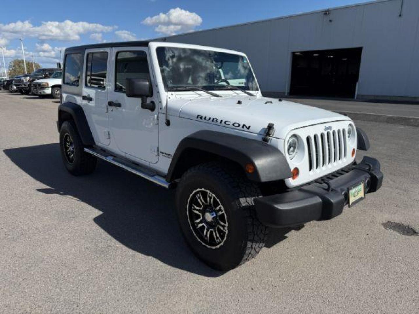 2012 Bright White Clearcoat /Black Jeep Wrangler Unlimited Rubicon (1C4BJWFG8CL) with an 3.6L V-6 DOHC engine, AUTOMATIC transmission, located at 1235 N Woodruff Ave., Idaho Falls, 83401, (208) 523-1053, 43.507172, -112.000488 - At Timberline Auto, finding a great deal on your next vehicle is always easy! Our experienced sales staff's goal is to help find you the right vehicle at the right price! Our knowledgeable finance department has options for almost any credit score. We offer extended service contract options to prote - Photo#7