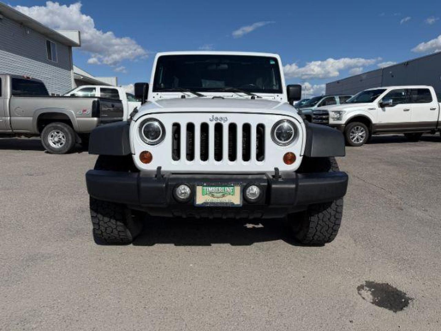 2012 Bright White Clearcoat /Black Jeep Wrangler Unlimited Rubicon (1C4BJWFG8CL) with an 3.6L V-6 DOHC engine, AUTOMATIC transmission, located at 1235 N Woodruff Ave., Idaho Falls, 83401, (208) 523-1053, 43.507172, -112.000488 - At Timberline Auto, finding a great deal on your next vehicle is always easy! Our experienced sales staff's goal is to help find you the right vehicle at the right price! Our knowledgeable finance department has options for almost any credit score. We offer extended service contract options to prote - Photo#8
