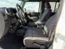 2012 Bright White Clearcoat /Black Jeep Wrangler Unlimited Rubicon (1C4BJWFG8CL) with an 3.6L V-6 DOHC engine, AUTOMATIC transmission, located at 1235 N Woodruff Ave., Idaho Falls, 83401, (208) 523-1053, 43.507172, -112.000488 - At Timberline Auto, finding a great deal on your next vehicle is always easy! Our experienced sales staff's goal is to help find you the right vehicle at the right price! Our knowledgeable finance department has options for almost any credit score. We offer extended service contract options to prote - Photo#10