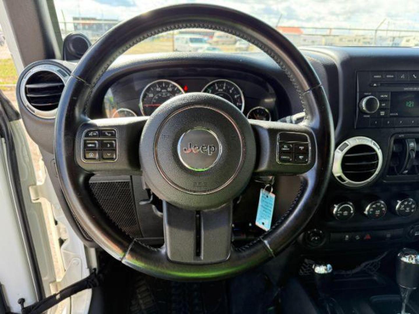 2012 Bright White Clearcoat /Black Jeep Wrangler Unlimited Rubicon (1C4BJWFG8CL) with an 3.6L V-6 DOHC engine, AUTOMATIC transmission, located at 1235 N Woodruff Ave., Idaho Falls, 83401, (208) 523-1053, 43.507172, -112.000488 - At Timberline Auto, finding a great deal on your next vehicle is always easy! Our experienced sales staff's goal is to help find you the right vehicle at the right price! Our knowledgeable finance department has options for almost any credit score. We offer extended service contract options to prote - Photo#12