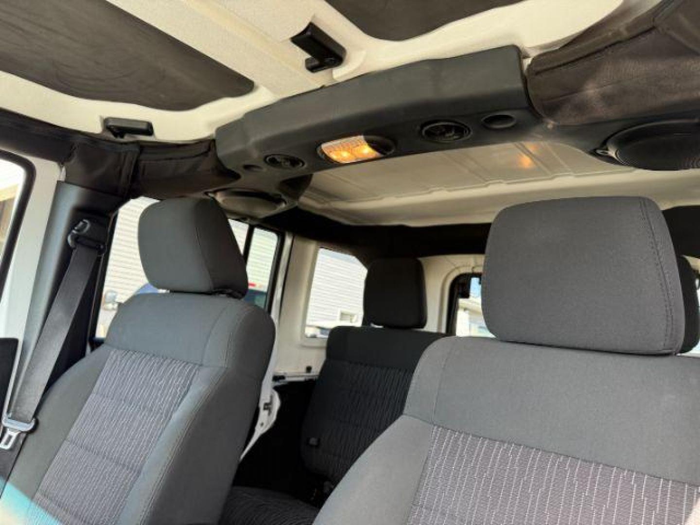 2012 Bright White Clearcoat /Black Jeep Wrangler Unlimited Rubicon (1C4BJWFG8CL) with an 3.6L V-6 DOHC engine, AUTOMATIC transmission, located at 1235 N Woodruff Ave., Idaho Falls, 83401, (208) 523-1053, 43.507172, -112.000488 - At Timberline Auto, finding a great deal on your next vehicle is always easy! Our experienced sales staff's goal is to help find you the right vehicle at the right price! Our knowledgeable finance department has options for almost any credit score. We offer extended service contract options to prote - Photo#15