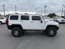 2006 WHITE /CLOTH HUMMER H3 SUV UNKNOWN (5GTDN136568) with an 3.5 engine, AUTOMATIC transmission, located at 1235 N Woodruff Ave., Idaho Falls, 83401, (208) 523-1053, 43.507172, -112.000488 - At Timberline Auto, finding a great deal on your next vehicle is always easy! Our experienced sales staff's goal is to help find you the right vehicle at the right price! Our knowledgeable finance department has options for almost any credit score. We offer extended service contract options to prote - Photo#5