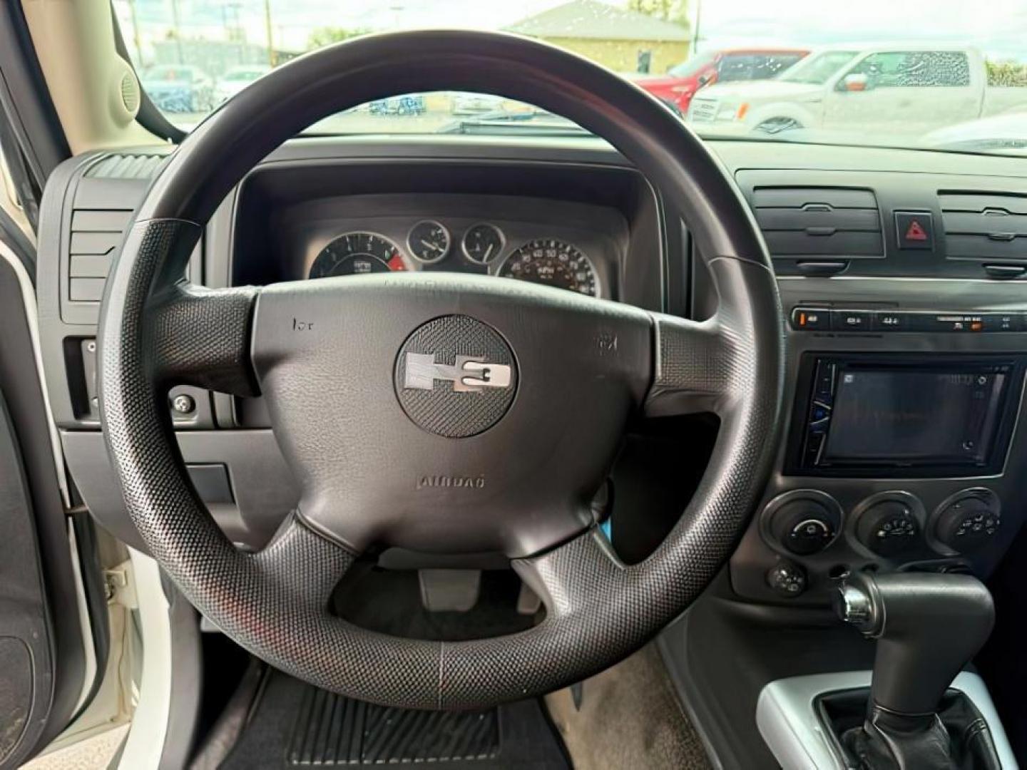 2006 WHITE /CLOTH Hummer H3 SUV (5GTDN136568) with an 35 engine, Automatic transmission, located at 1175 N Woodruff Ave, Idaho Falls, ID, 83401, 43.506901, -111.999657 - At Timberline Auto, finding a great deal on your next vehicle is always easy! Our experienced sales staff's goal is to help find you the right vehicle at the right price! Our knowledgeable finance department has options for almost any credit score. We offer extended service contract options to prote - Photo#11