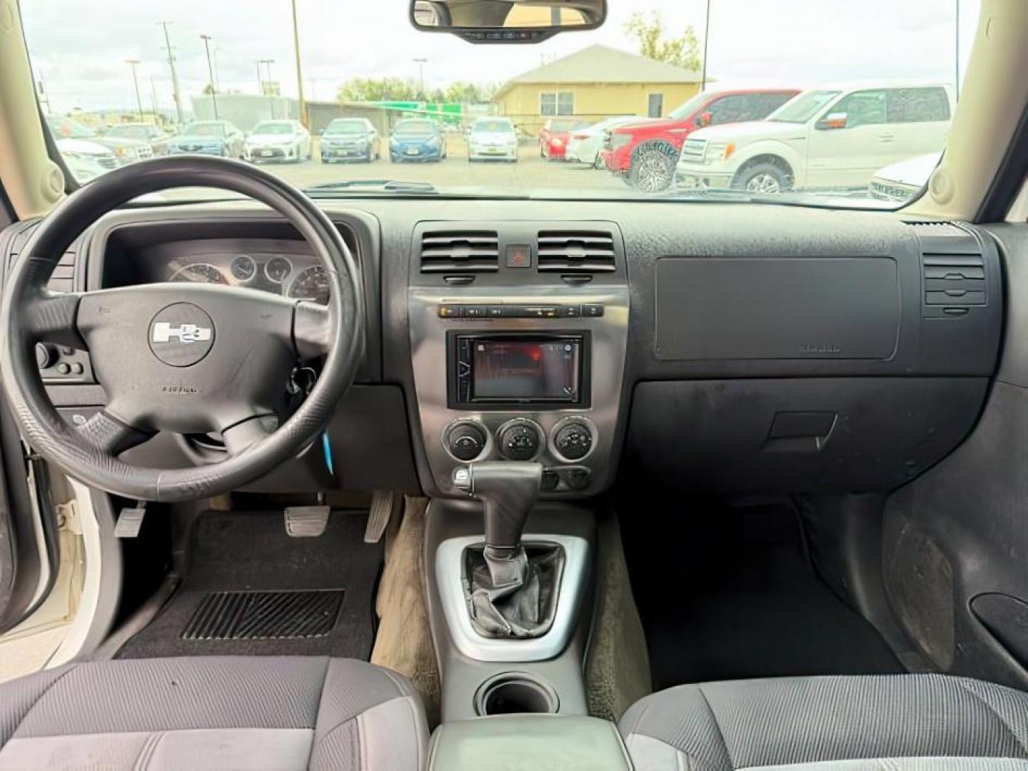 2006 WHITE /CLOTH Hummer H3 SUV (5GTDN136568) with an 35 engine, Automatic transmission, located at 1175 N Woodruff Ave, Idaho Falls, ID, 83401, 43.506901, -111.999657 - At Timberline Auto, finding a great deal on your next vehicle is always easy! Our experienced sales staff's goal is to help find you the right vehicle at the right price! Our knowledgeable finance department has options for almost any credit score. We offer extended service contract options to prote - Photo#15