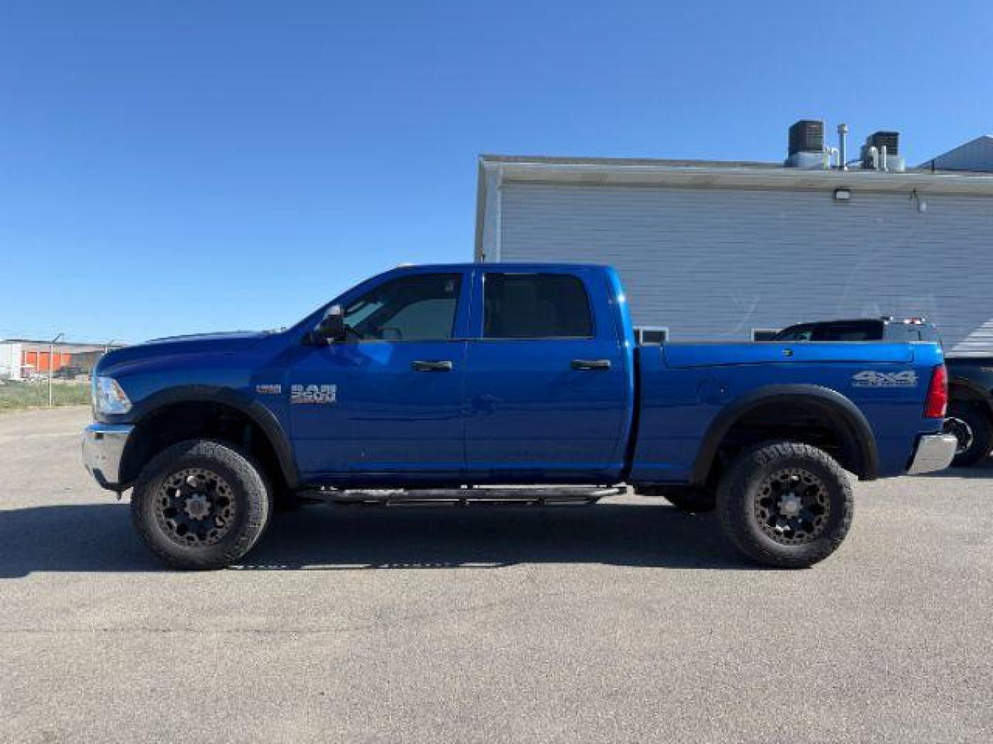 2017 Blue Streak Pearlcoat /Diesel Gray/Black Ram 2500 Tradesman Crew Cab 4x4 6'4 Box (3C6UR5CJ4HG) with an HEMI 6.4L V-8 VVT variable valve control engine, AUTOMATIC transmission, located at 1235 N Woodruff Ave., Idaho Falls, 83401, (208) 523-1053, 43.507172, -112.000488 - At Timberline Auto, finding a great deal on your next vehicle is always easy! Our experienced sales staff's goal is to help find you the right vehicle at the right price! Our knowledgeable finance department has options for almost any credit score. We offer extended service contract options to prote - Photo#1