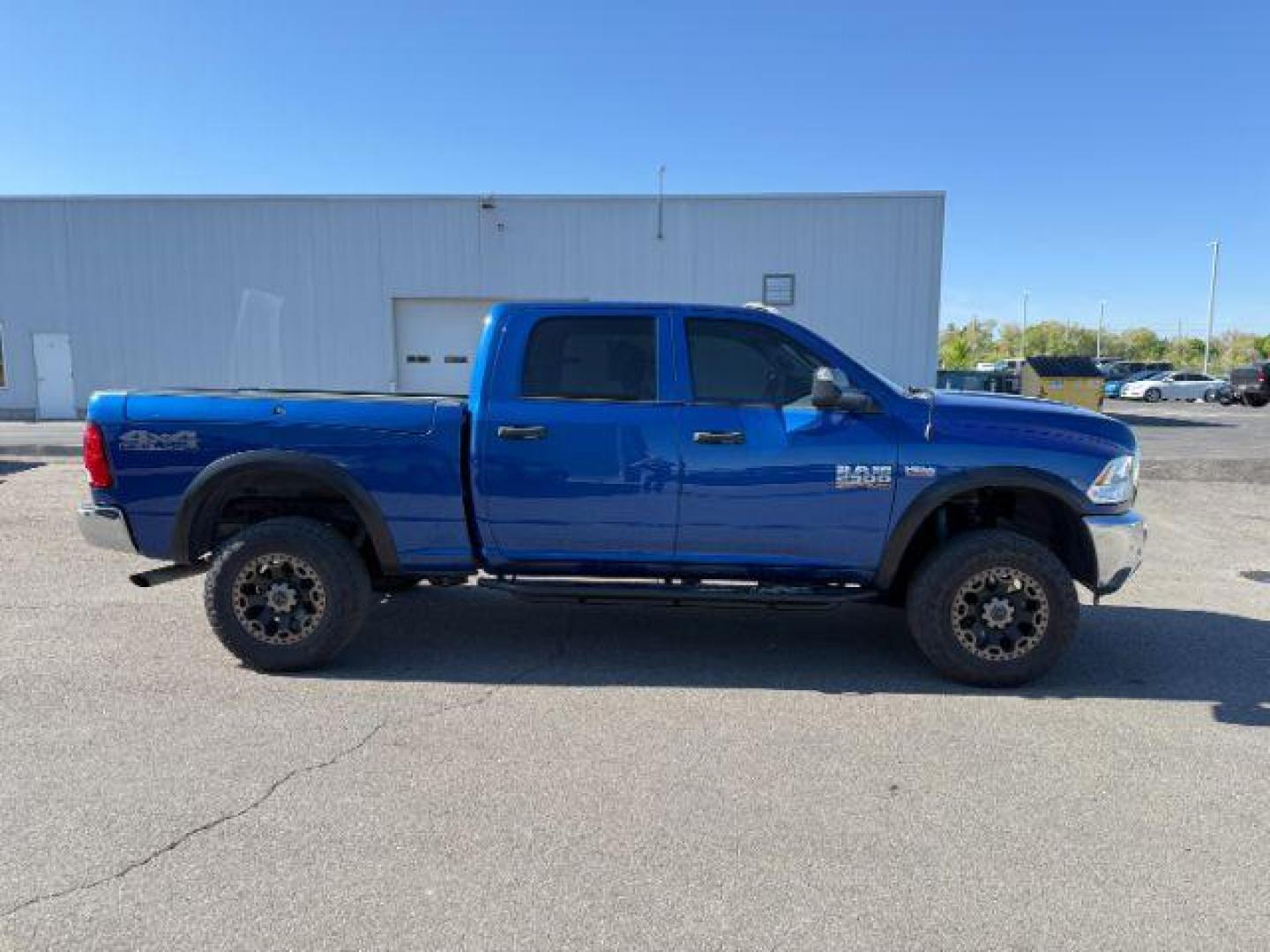 2017 Blue Streak Pearlcoat /Diesel Gray/Black Ram 2500 Tradesman Crew Cab 4x4 6'4 Box (3C6UR5CJ4HG) with an HEMI 6.4L V-8 VVT variable valve control engine, AUTOMATIC transmission, located at 1235 N Woodruff Ave., Idaho Falls, 83401, (208) 523-1053, 43.507172, -112.000488 - At Timberline Auto, finding a great deal on your next vehicle is always easy! Our experienced sales staff's goal is to help find you the right vehicle at the right price! Our knowledgeable finance department has options for almost any credit score. We offer extended service contract options to prote - Photo#8