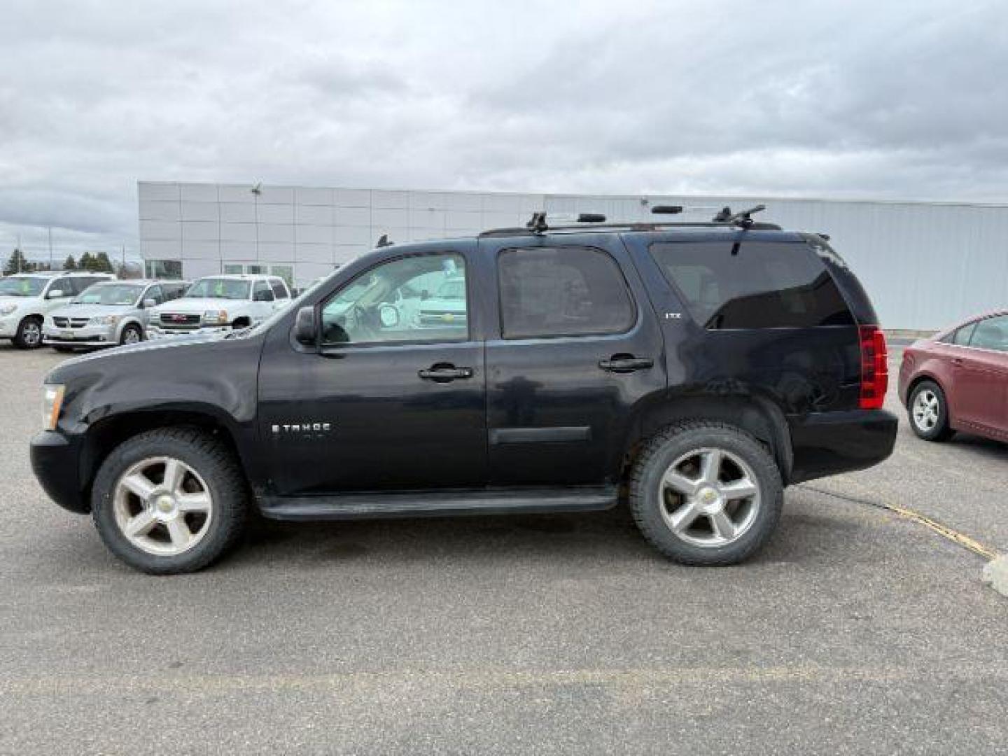2007 Black /Ebony Chevrolet Tahoe LTZ (1GNFK13087R) with an 5.3 engine, AUTOMATIC transmission, located at 1235 N Woodruff Ave., Idaho Falls, 83401, (208) 523-1053, 43.507172, -112.000488 - At Timberline Auto, finding a great deal on your next vehicle is always easy! Our experienced sales staff's goal is to help find you the right vehicle at the right price! Our knowledgeable finance department has options for almost any credit score. We offer extended service contract options to prote - Photo#0