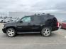 2007 Black /Ebony Chevrolet Tahoe LTZ (1GNFK13087R) with an 5.3 engine, AUTOMATIC transmission, located at 1235 N Woodruff Ave., Idaho Falls, 83401, (208) 523-1053, 43.507172, -112.000488 - At Timberline Auto, finding a great deal on your next vehicle is always easy! Our experienced sales staff's goal is to help find you the right vehicle at the right price! Our knowledgeable finance department has options for almost any credit score. We offer extended service contract options to prote - Photo#0