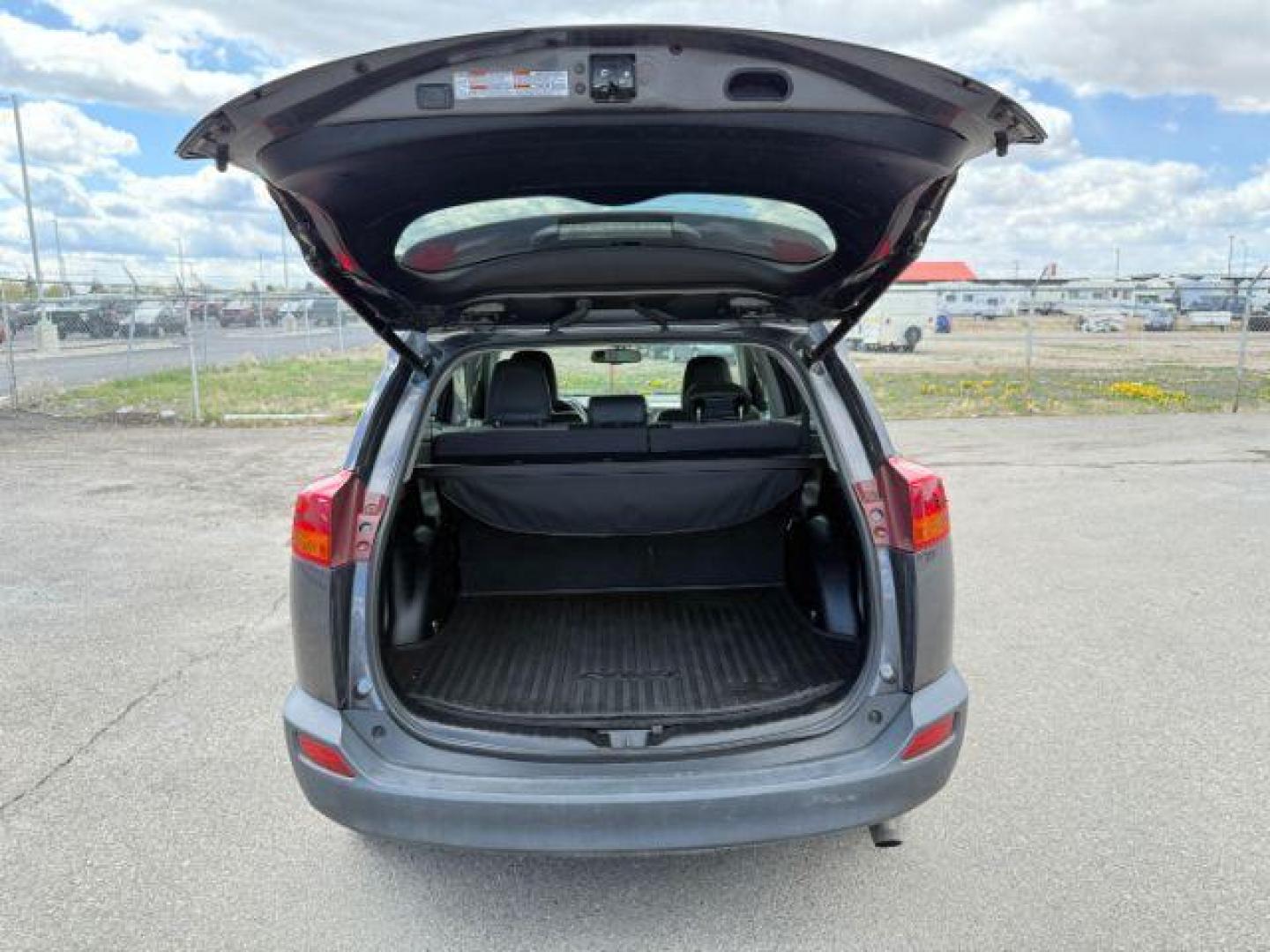 2015 Magnetic Gray Metallic /Black Toyota RAV4 (2T3DFREV9FW) with an 25L I-4 DOHC engine, Automatic transmission, located at 1175 N Woodruff Ave, Idaho Falls, ID, 83401, 43.506901, -111.999657 - At Timberline Auto, finding a great deal on your next vehicle is always easy! Our experienced sales staff's goal is to help find you the right vehicle at the right price! Our knowledgeable finance department has options for almost any credit score. We offer extended service contract options to prote - Photo#29