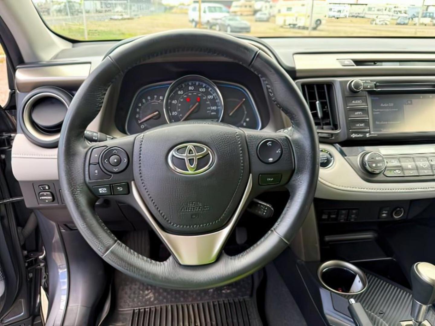 2015 Magnetic Gray Metallic /Black Toyota RAV4 (2T3DFREV9FW) with an 25L I-4 DOHC engine, Automatic transmission, located at 1175 N Woodruff Ave, Idaho Falls, ID, 83401, 43.506901, -111.999657 - At Timberline Auto, finding a great deal on your next vehicle is always easy! Our experienced sales staff's goal is to help find you the right vehicle at the right price! Our knowledgeable finance department has options for almost any credit score. We offer extended service contract options to prote - Photo#14