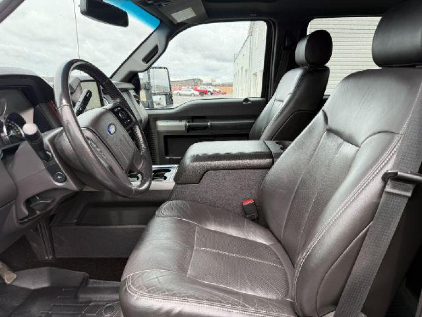 2014 Tuxedo Black Metallic /Black Ford F-350 LARIAT (1FT8W3BT7EE) with an Powerstroke 6.7L V-8 diesel direct injection engine, AUTOMATIC transmission, located at 1235 N Woodruff Ave., Idaho Falls, 83401, (208) 523-1053, 43.507172, -112.000488 - At Timberline Auto, finding a great deal on your next vehicle is always easy! Our experienced sales staff's goal is to help find you the right vehicle at the right price! Our knowledgeable finance department has options for almost any credit score. We offer extended service contract options to prote - Photo#10