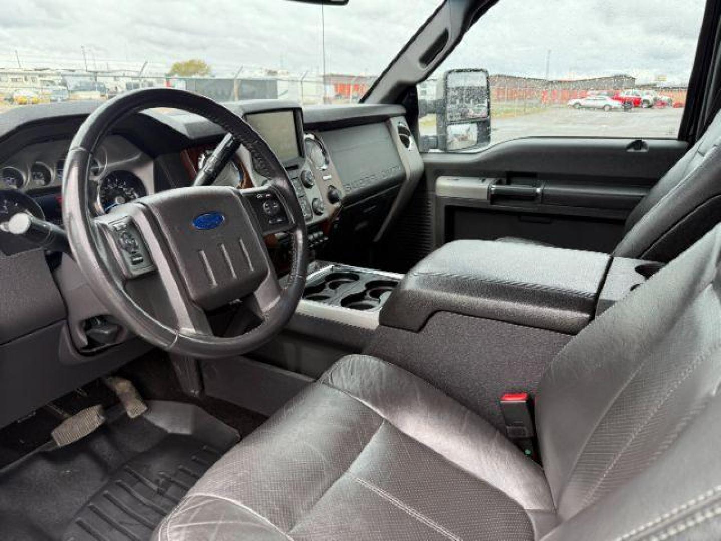 2014 Tuxedo Black Metallic /Black Ford F-350 LARIAT (1FT8W3BT7EE) with an Powerstroke 6.7L V-8 diesel direct injection engine, AUTOMATIC transmission, located at 1235 N Woodruff Ave., Idaho Falls, 83401, (208) 523-1053, 43.507172, -112.000488 - At Timberline Auto, finding a great deal on your next vehicle is always easy! Our experienced sales staff's goal is to help find you the right vehicle at the right price! Our knowledgeable finance department has options for almost any credit score. We offer extended service contract options to prote - Photo#11