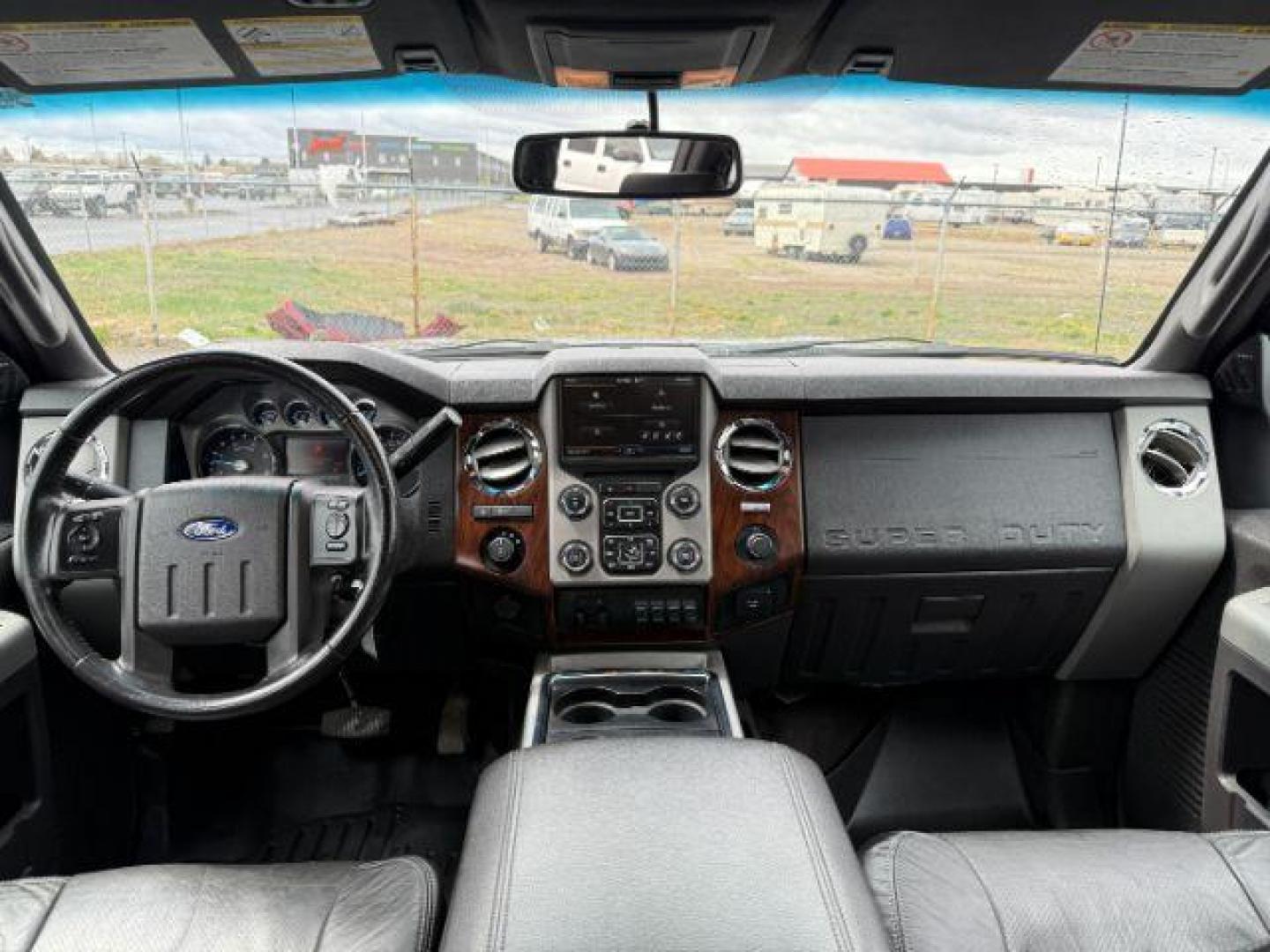 2014 Tuxedo Black Metallic /Black Ford F-350 LARIAT (1FT8W3BT7EE) with an Powerstroke 6.7L V-8 diesel direct injection engine, AUTOMATIC transmission, located at 1235 N Woodruff Ave., Idaho Falls, 83401, (208) 523-1053, 43.507172, -112.000488 - At Timberline Auto, finding a great deal on your next vehicle is always easy! Our experienced sales staff's goal is to help find you the right vehicle at the right price! Our knowledgeable finance department has options for almost any credit score. We offer extended service contract options to prote - Photo#19