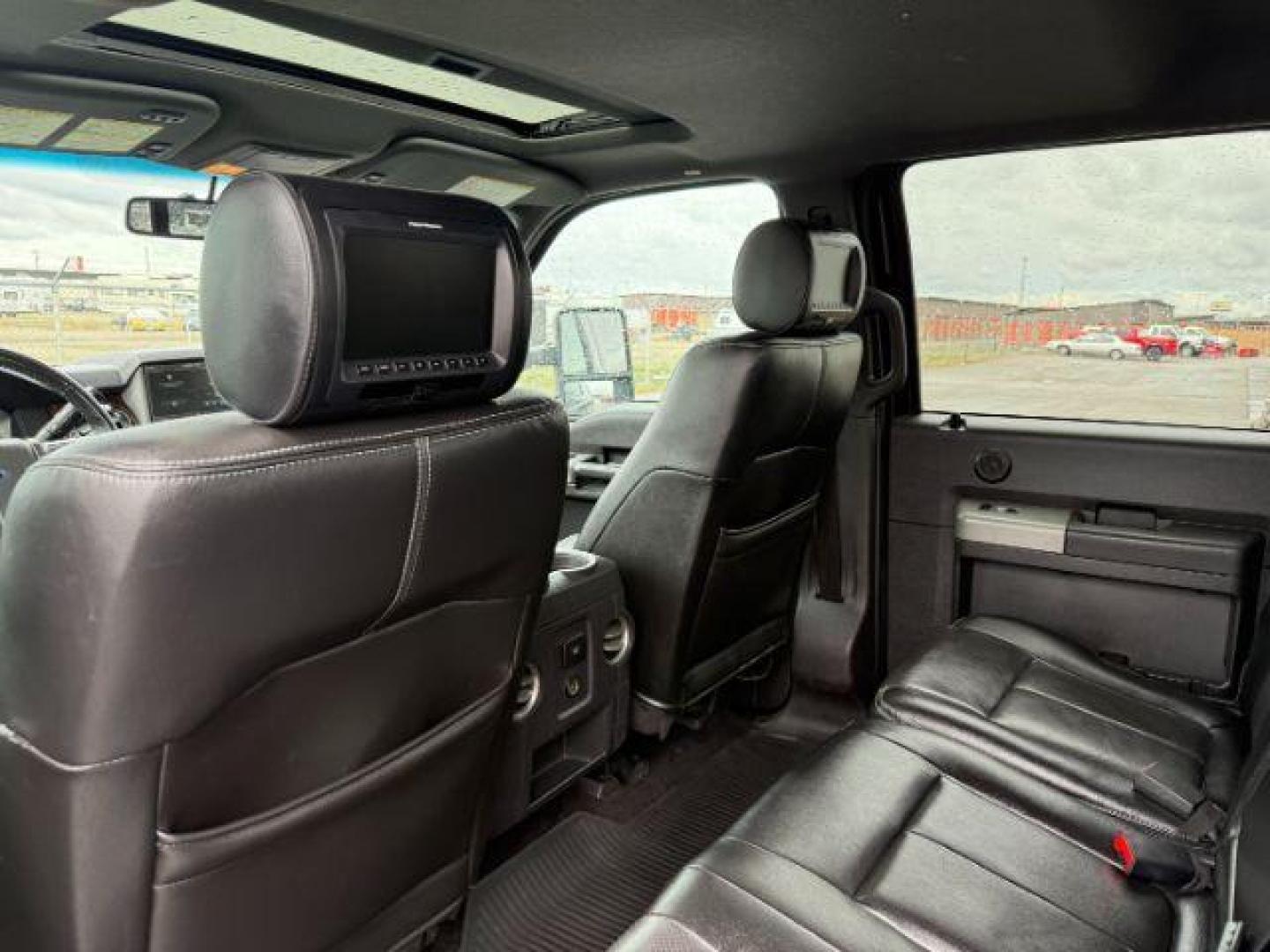 2014 Tuxedo Black Metallic /Black Ford F-350 LARIAT (1FT8W3BT7EE) with an Powerstroke 6.7L V-8 diesel direct injection engine, AUTOMATIC transmission, located at 1235 N Woodruff Ave., Idaho Falls, 83401, (208) 523-1053, 43.507172, -112.000488 - At Timberline Auto, finding a great deal on your next vehicle is always easy! Our experienced sales staff's goal is to help find you the right vehicle at the right price! Our knowledgeable finance department has options for almost any credit score. We offer extended service contract options to prote - Photo#21