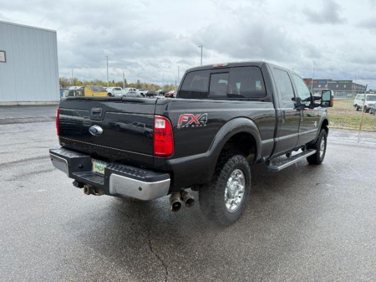 2014 Tuxedo Black Metallic /Black Ford F-350 LARIAT (1FT8W3BT7EE) with an Powerstroke 6.7L V-8 diesel direct injection engine, AUTOMATIC transmission, located at 1235 N Woodruff Ave., Idaho Falls, 83401, (208) 523-1053, 43.507172, -112.000488 - At Timberline Auto, finding a great deal on your next vehicle is always easy! Our experienced sales staff's goal is to help find you the right vehicle at the right price! Our knowledgeable finance department has options for almost any credit score. We offer extended service contract options to prote - Photo#5