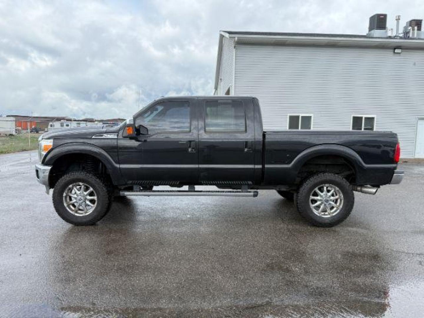 2012 Black /Black Ford F-250 LARIAT (1FT7W2BT2CE) with an Powerstroke 6.7L V-8 diesel direct injection engine, AUTOMATIC transmission, located at 1235 N Woodruff Ave., Idaho Falls, 83401, (208) 523-1053, 43.507172, -112.000488 - Photo#1
