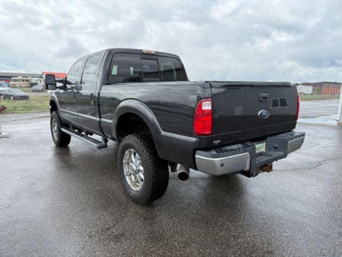 2012 Black /Black Ford F-250 LARIAT (1FT7W2BT2CE) with an Powerstroke 6.7L V-8 diesel direct injection engine, AUTOMATIC transmission, located at 1235 N Woodruff Ave., Idaho Falls, 83401, (208) 523-1053, 43.507172, -112.000488 - Photo#2