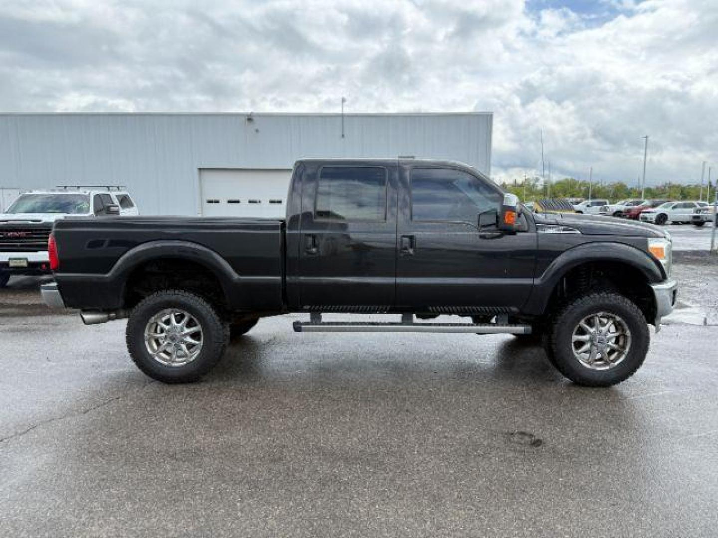 2012 Black /Black Ford F-250 LARIAT (1FT7W2BT2CE) with an Powerstroke 6.7L V-8 diesel direct injection engine, AUTOMATIC transmission, located at 1235 N Woodruff Ave., Idaho Falls, 83401, (208) 523-1053, 43.507172, -112.000488 - Photo#7