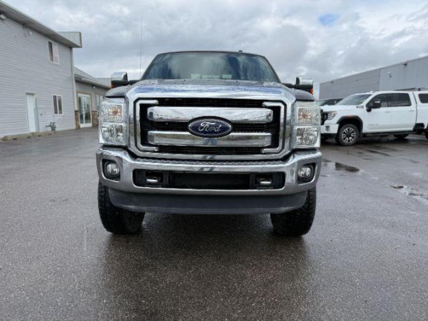 2012 Black /Black Ford F-250 LARIAT (1FT7W2BT2CE) with an Powerstroke 6.7L V-8 diesel direct injection engine, AUTOMATIC transmission, located at 1235 N Woodruff Ave., Idaho Falls, 83401, (208) 523-1053, 43.507172, -112.000488 - Photo#9