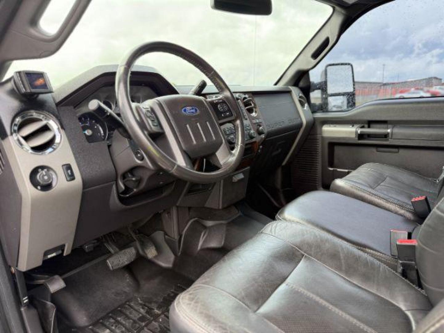 2012 Black /Black Ford F-250 LARIAT (1FT7W2BT2CE) with an Powerstroke 6.7L V-8 diesel direct injection engine, AUTOMATIC transmission, located at 1235 N Woodruff Ave., Idaho Falls, 83401, (208) 523-1053, 43.507172, -112.000488 - Photo#12