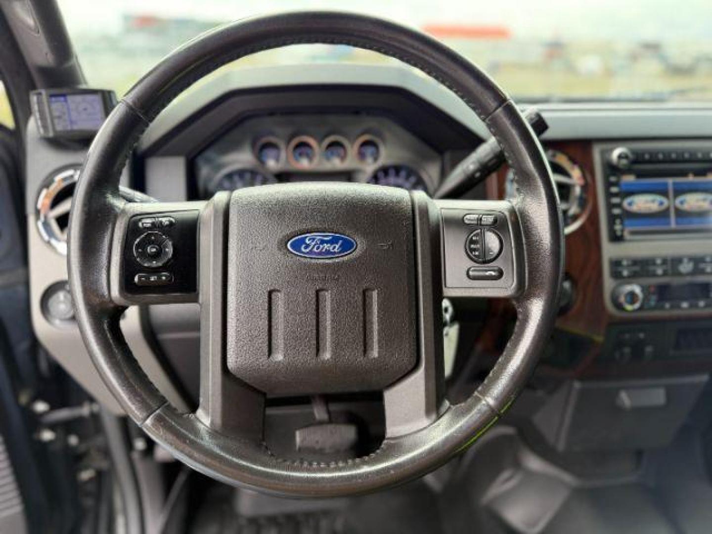 2012 Black /Black Ford F-250 LARIAT (1FT7W2BT2CE) with an Powerstroke 6.7L V-8 diesel direct injection engine, AUTOMATIC transmission, located at 1235 N Woodruff Ave., Idaho Falls, 83401, (208) 523-1053, 43.507172, -112.000488 - Photo#13