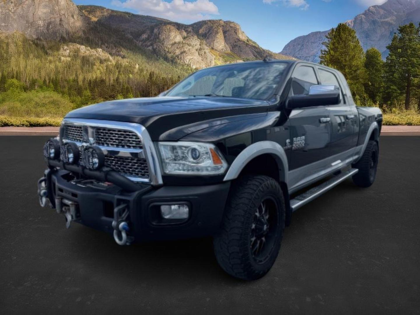 2013 Black Clearcoat /Black Ram 2500 (3C6UR5NL8DG) with an Cummins 67L I-6 diesel direct injection engine, Automatic transmission, located at 1175 N Woodruff Ave, Idaho Falls, ID, 83401, 43.506901, -111.999657 - At Timberline Auto, finding a great deal on your next vehicle is always easy! Our experienced sales staff's goal is to help find you the right vehicle at the right price! Our knowledgeable finance department has options for almost any credit score. We offer extended service contract options to prote - Photo#0