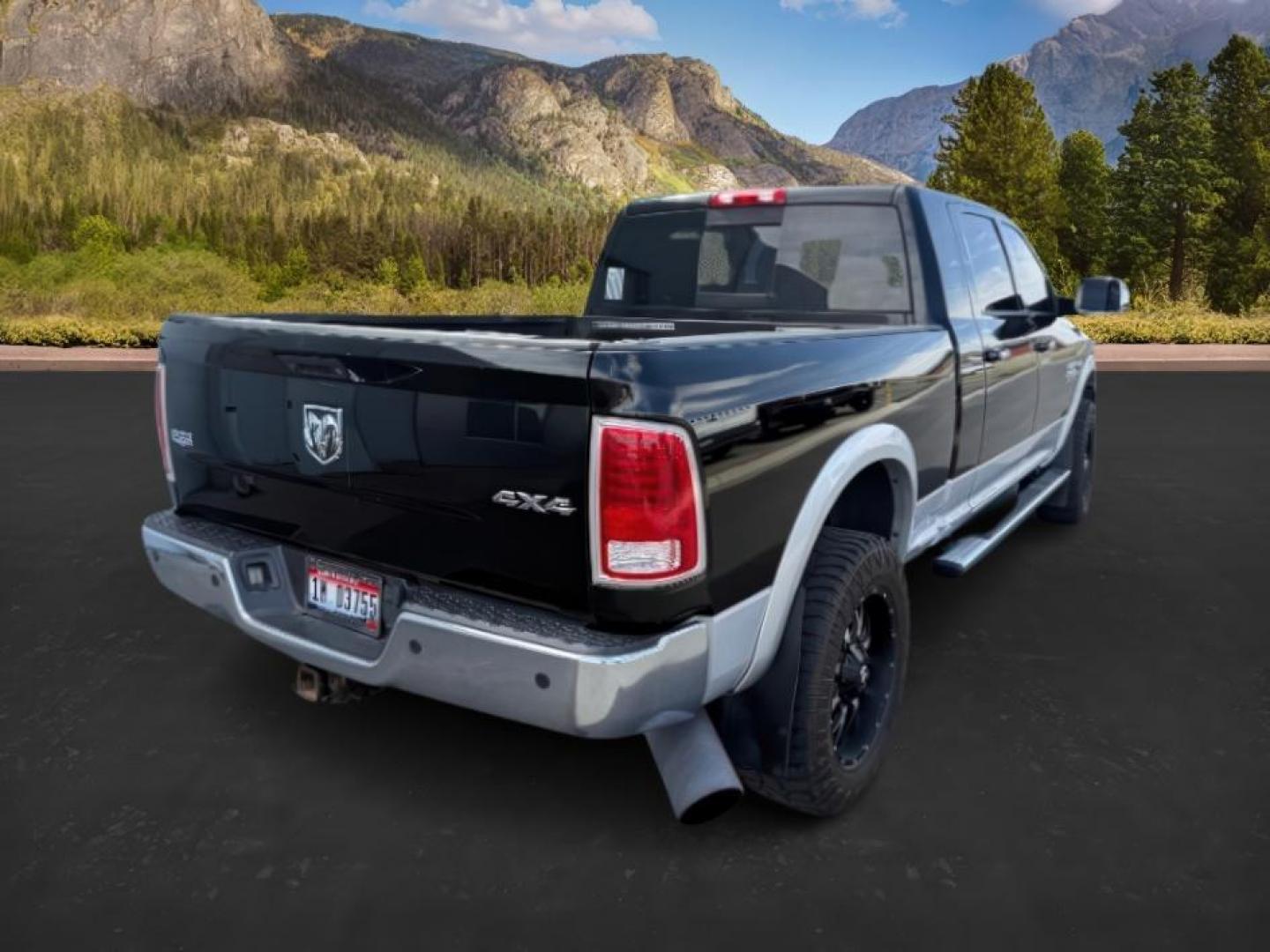 2013 Black Clearcoat /Black Ram 2500 (3C6UR5NL8DG) with an Cummins 67L I-6 diesel direct injection engine, Automatic transmission, located at 1175 N Woodruff Ave, Idaho Falls, ID, 83401, 43.506901, -111.999657 - At Timberline Auto, finding a great deal on your next vehicle is always easy! Our experienced sales staff's goal is to help find you the right vehicle at the right price! Our knowledgeable finance department has options for almost any credit score. We offer extended service contract options to prote - Photo#4