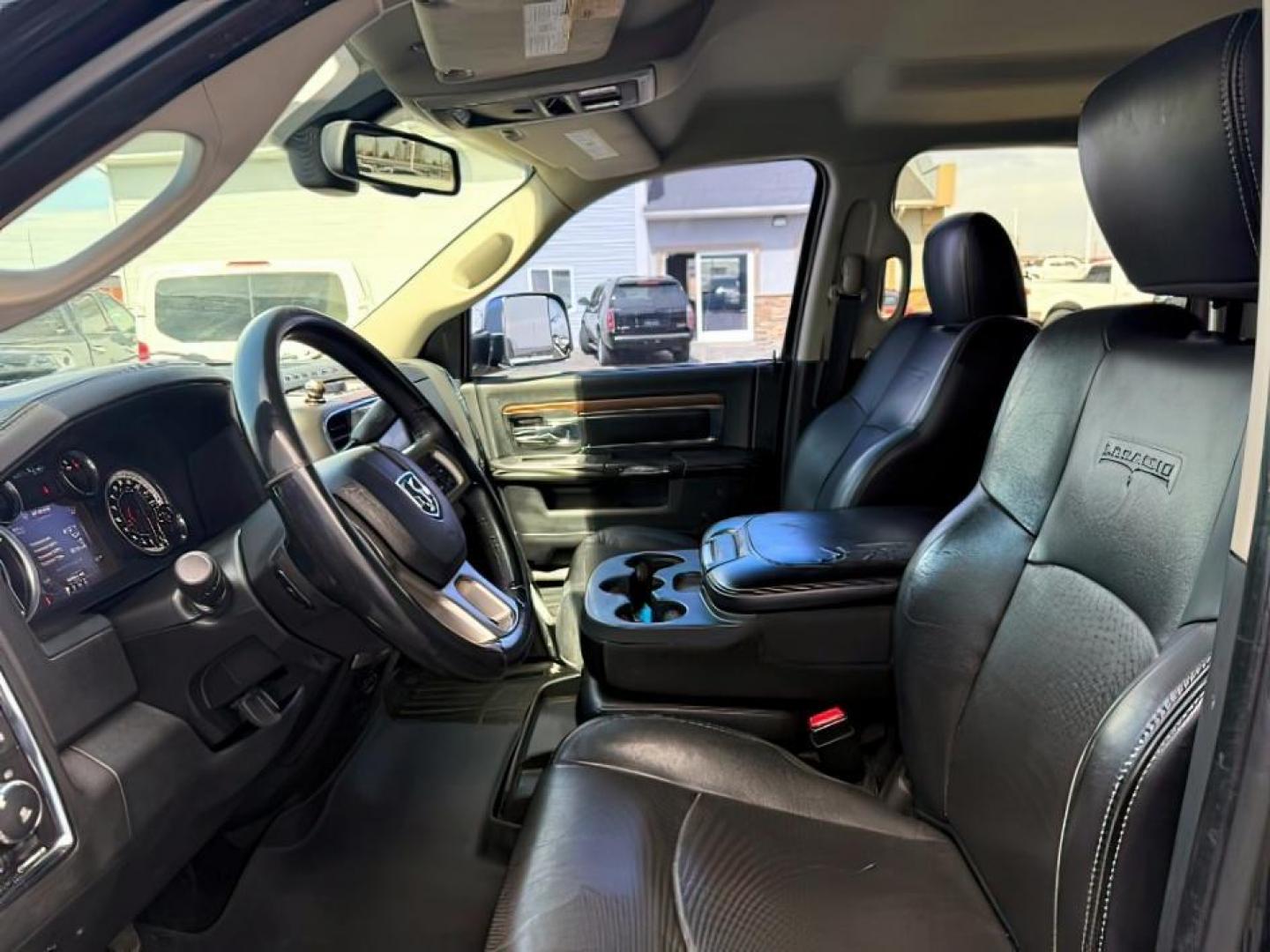 2013 Black Clearcoat /Black Ram 2500 (3C6UR5NL8DG) with an Cummins 67L I-6 diesel direct injection engine, Automatic transmission, located at 1175 N Woodruff Ave, Idaho Falls, ID, 83401, 43.506901, -111.999657 - At Timberline Auto, finding a great deal on your next vehicle is always easy! Our experienced sales staff's goal is to help find you the right vehicle at the right price! Our knowledgeable finance department has options for almost any credit score. We offer extended service contract options to prote - Photo#11